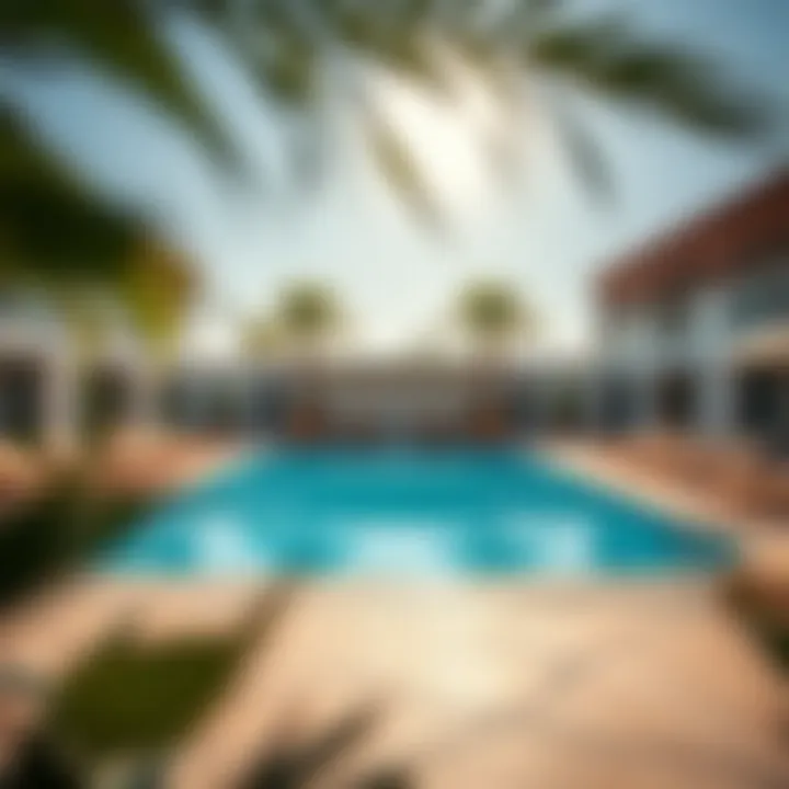 Outdoor pool area with sun loungers